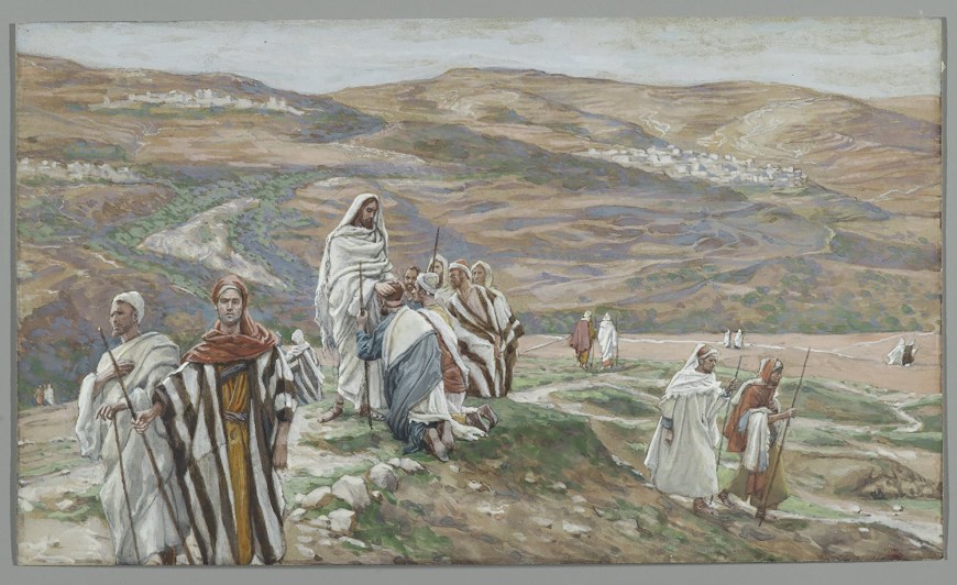 A group of people dressed in historical garments on a hillside, with a vast landscape of rolling hills and a distant village in the background.